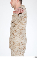  Photos Army Man in Camouflage uniform 11 21th century Army Desert uniform jacket upper body 0004.jpg